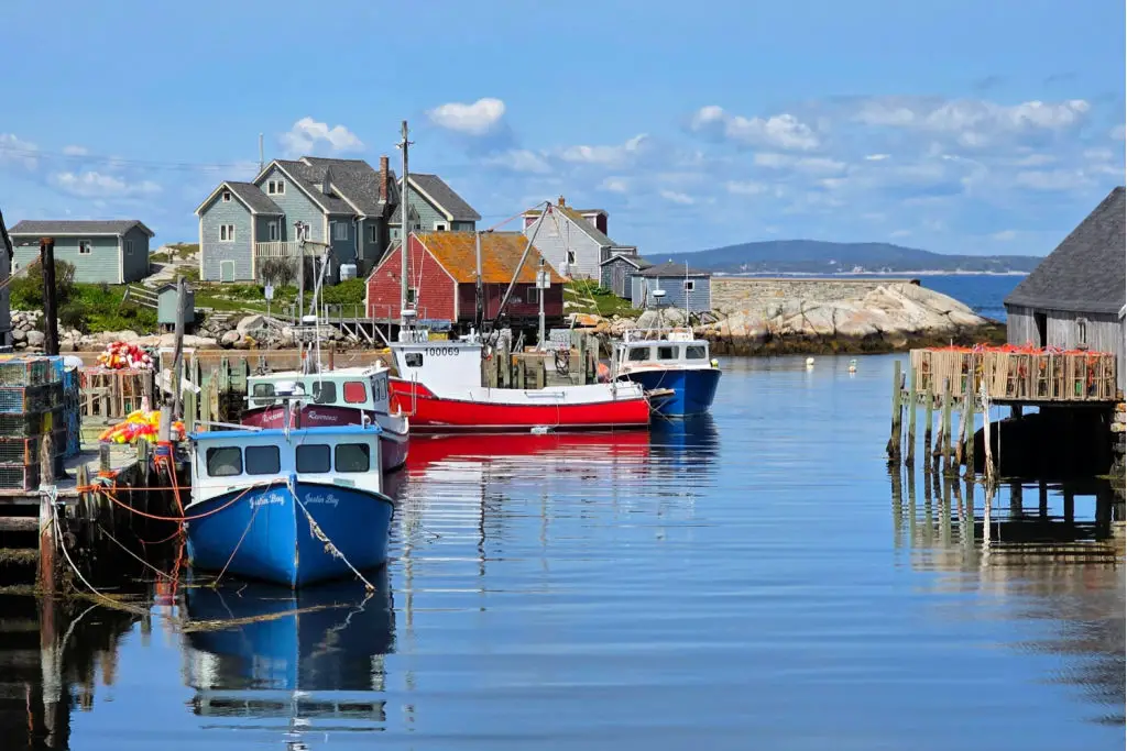 peggys cove colorful boats nova scotia canada