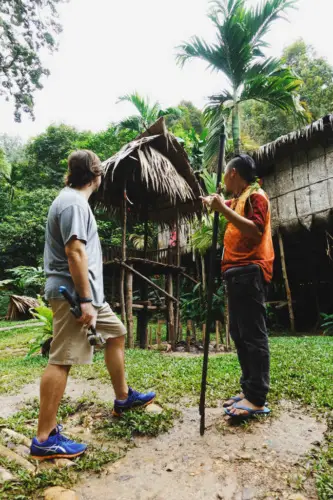 exploring borneo island Mari Mari Cultural Village blow gun