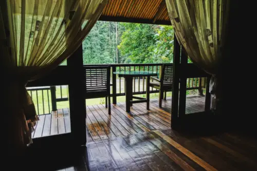 exploring borneo island chalet balcony